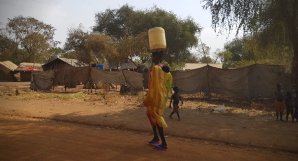 woman in Maban, South Sudan carrying water on top of her head