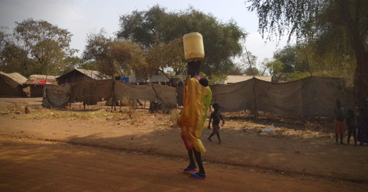 woman in Maban, South Sudan carrying water on top of her head