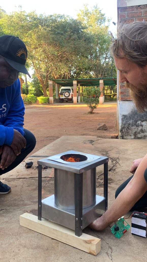 a stove is being lit with sustainable biomass briquettes