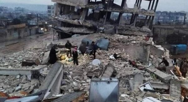 collapsed building in Aleppo. aftermath of earthquake.