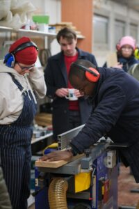 refugees in a wood workshop 