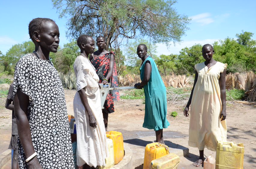 women farmers in South Sudan gathering water at a village borehole