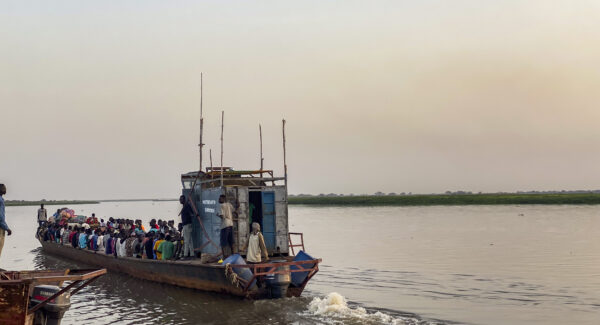 Refugees flee Sudan war by boat soon to dock at Renk.