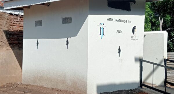 new contruction of toilet facilities at St mark's primary school in Maban, South Sudan. IJI's logo appears with the caption 'with gratitude'