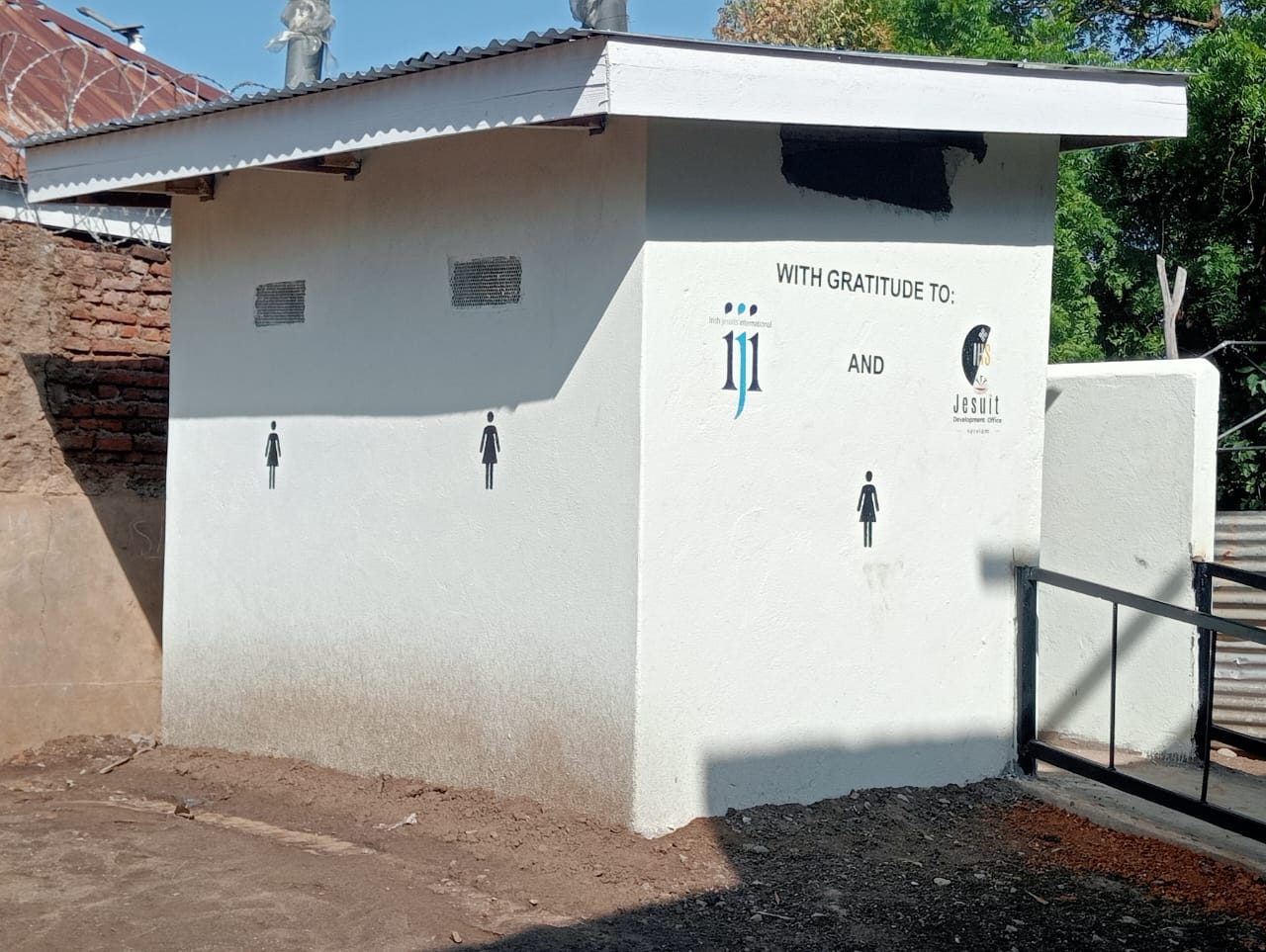 new contruction of toilet facilities at St mark's primary school in Maban, South Sudan. IJI's logo appears with the caption 'with gratitude'