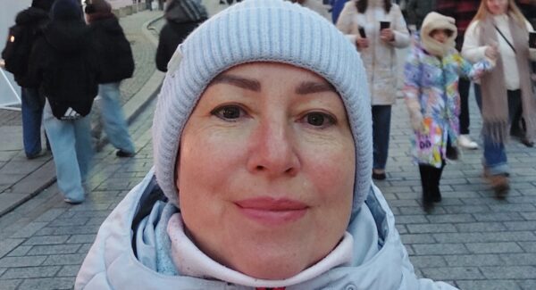 Anhelina takes a selfie in Warsaw. she is a Ukrainian refugee.