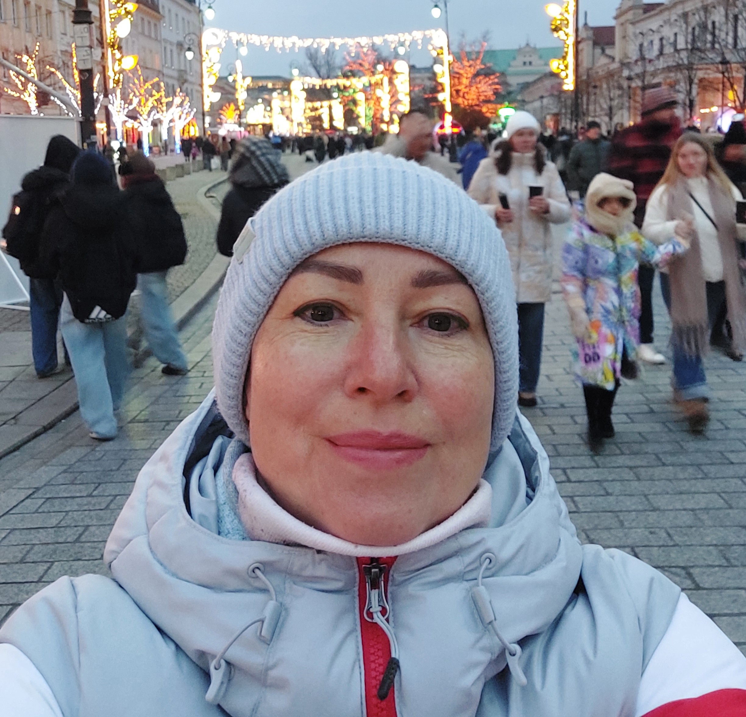 Anhelina takes a selfie in Warsaw. she is a Ukrainian refugee.